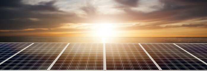 Wall Mural - panoramic - solar panel at sunset in the sea