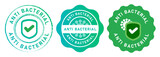 Fototapeta  - Anti bacterial microbe bacterium hygiene bacteria protection symbol shield tested check mark symbol emblem tag design in green