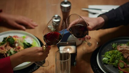 Wall Mural - Fancy couple having dinner at restaurant table on night date. Romantic concept.