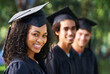 © Mapodile M./peopleimages.com - Bright young grads. Portrait of a diverse group of students on graduation day.