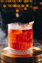 Classic Old Fashioned Cocktail In A Retro Glass With Smoke
