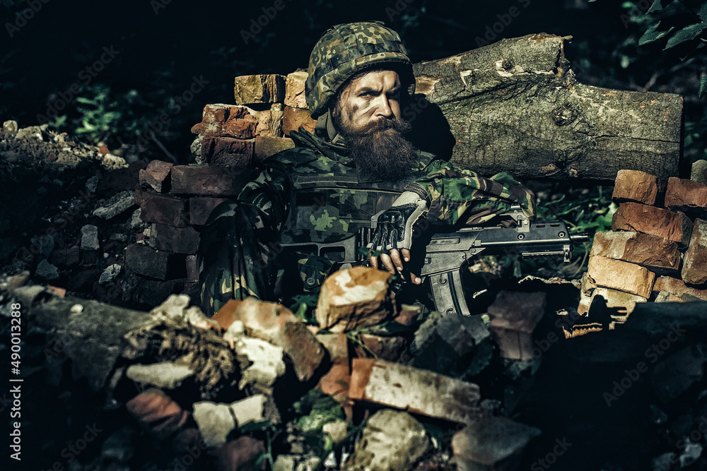 Military operation. Shooting with assault rifle and machine gun ...
