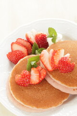 Wall Mural - Homemade strawberries and pancake in pink color for cafe food 