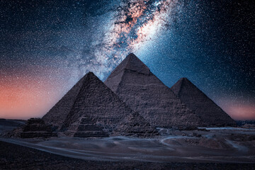 Wall Mural - The Pyramids of Giza by night in Egypt 