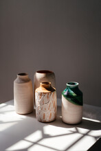 Minimalist Handmade Clay Vases On A White Background With Daylight