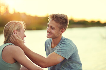 Canvas Print - It was definitely love at first sight. Cropped shot of an affectionate young couple spending quality time together outside.