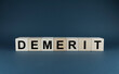 Cubes form a word, Demerit. Business and demerit concept.