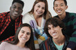 Multiracial millennial generation people smiling on camera - Portrait of young diverse friends