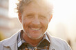 © Jeff Bergen/peopleimages.com - Hes got a sunny outlook on life. Portrait of a friendly-looking middle aged man outside.