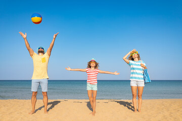 Wall Mural - Happy family having fun on summer vacation