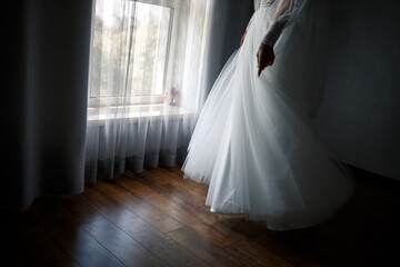 Wall Mural - Beautiful young girl bride on a wedding day. White wedding dress. Modern dressy clothes for women