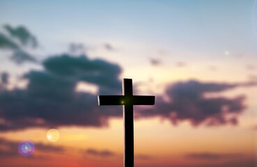 Wall Mural - The wooden Cross at the sunset sky background