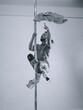 Pole dance man, young venezuelan doing striptease in the pole dance studio