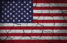 US American Flag Painted On A Cracked Concrete Wall