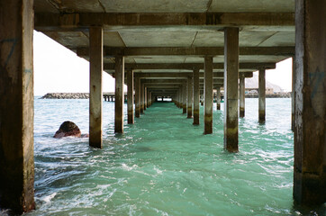 Sticker - Perspective photo under the pier bridge Oahu Hawaii