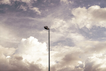 Canvas Print - Street light pole against a scenic cloudy sky