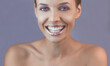 Perfect teeth smile with tinsel lips. Beautiful close up tanned Face of Young Woman with Clean Fresh Skin in retro style. Beautiful Spa Woman Smiling. Perfect Fresh Skin. Youth and Skin Care Concept