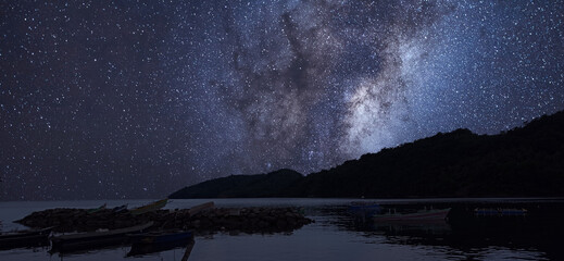 Wall Mural - Beautiful night landscape shot of milky way