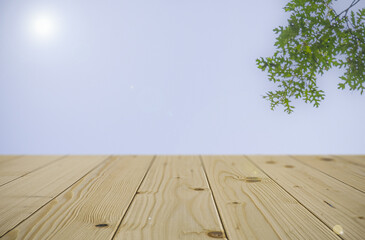 Wall Mural - closeup shot of a wooden table in a forest during the day