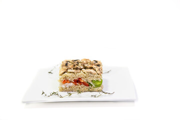 Canvas Print - Closeup shot of quinoa with mushrooms, red, green bell pepper, and onion on a white background