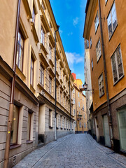 Wall Mural - Empty street with old buildings in the city of Gamla stan, Sweden