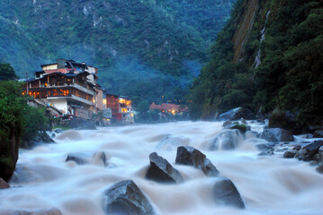 Poster - River near the town at dusk