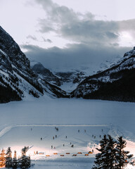 Sticker - Beautiful view of the skating rink with people and mountains in the background