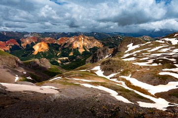 Wall Mural - Breathtaking view of winter mountain landscape under a cloudy sky