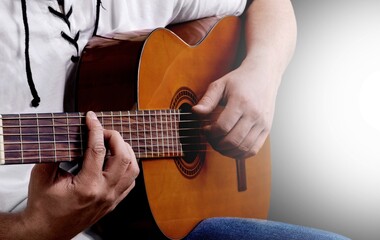 Sticker - Guitarist male hands playing the guitar. Classical concert, performance, show.