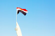Egypt flag, against the blue sky
