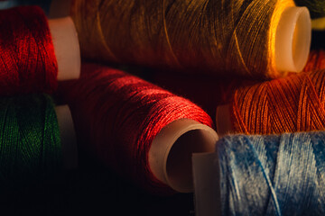 Canvas Print - Selective focus shot of colorful rope rolls