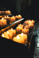 Canvas Print - Vertical shot of burning candles