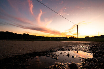 Wall Mural - beautiful sunset view in a village