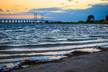 Wall Mural - Oresund bridge between Denmark and Sweden seen in sunset from the Swedish side