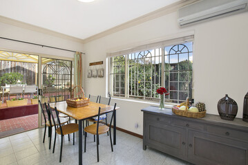 Canvas Print - Classic dining room with creamy walls and tile floors. Sydney, Australia, Real Estate