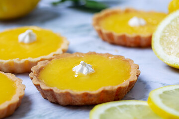 Closeup shot of flat lemon pastries on a kitchen table