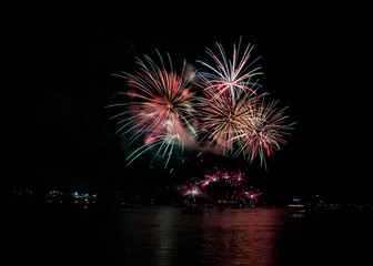 Sticker - Huge colorful British firework championships held at Plymouth, Devon against the night sky