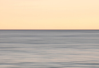 Wall Mural - beautiful photo of the sea at sunset and clear sky