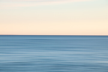 Wall Mural - beautiful photo of the sea at sunset and clear sky