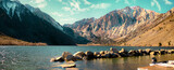 Fototapeta Fototapety góry  - Panoramic landscape of the lakeside mountains at dawn