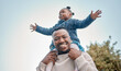 © Nicholas F/peopleimages.com - Shes always going to be my little princess. Portrait of a father carrying his daughter on his shoulders outdoors.