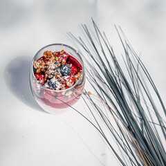 Poster - Delicious dessert with fresh berries and greek yogurt on a white surface