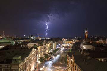 Wall Mural - Beautiful view of a thunderstorm hits and lightning over Helsingborg at night, Sweden