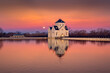 Beautiful shot of a historic building on a lake shore at sunset in Louisville, Kentucky