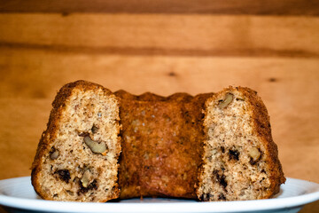 Canvas Print - Slice of whole wheat bread with nuts served on a plate