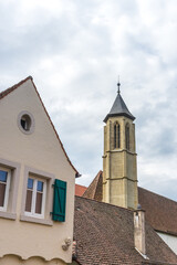 Sticker - Vertical shot of the church of Rothenburg ob der Tauber against a cloudy sky