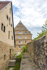 Sticker - Vertical shot of a historic stone building in Rothenburg ob der Tauber, Germany