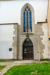 Sticker - Vertical shot of a historic stone building entrance in Rothenburg ob der Tauber, Germany