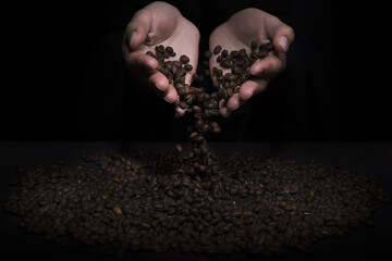 Poster - Woman's hands holding roasted coffee beans