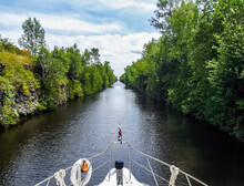 Yacht On The Trent-Severn Waterway Surrounded By Greenery In Canada
